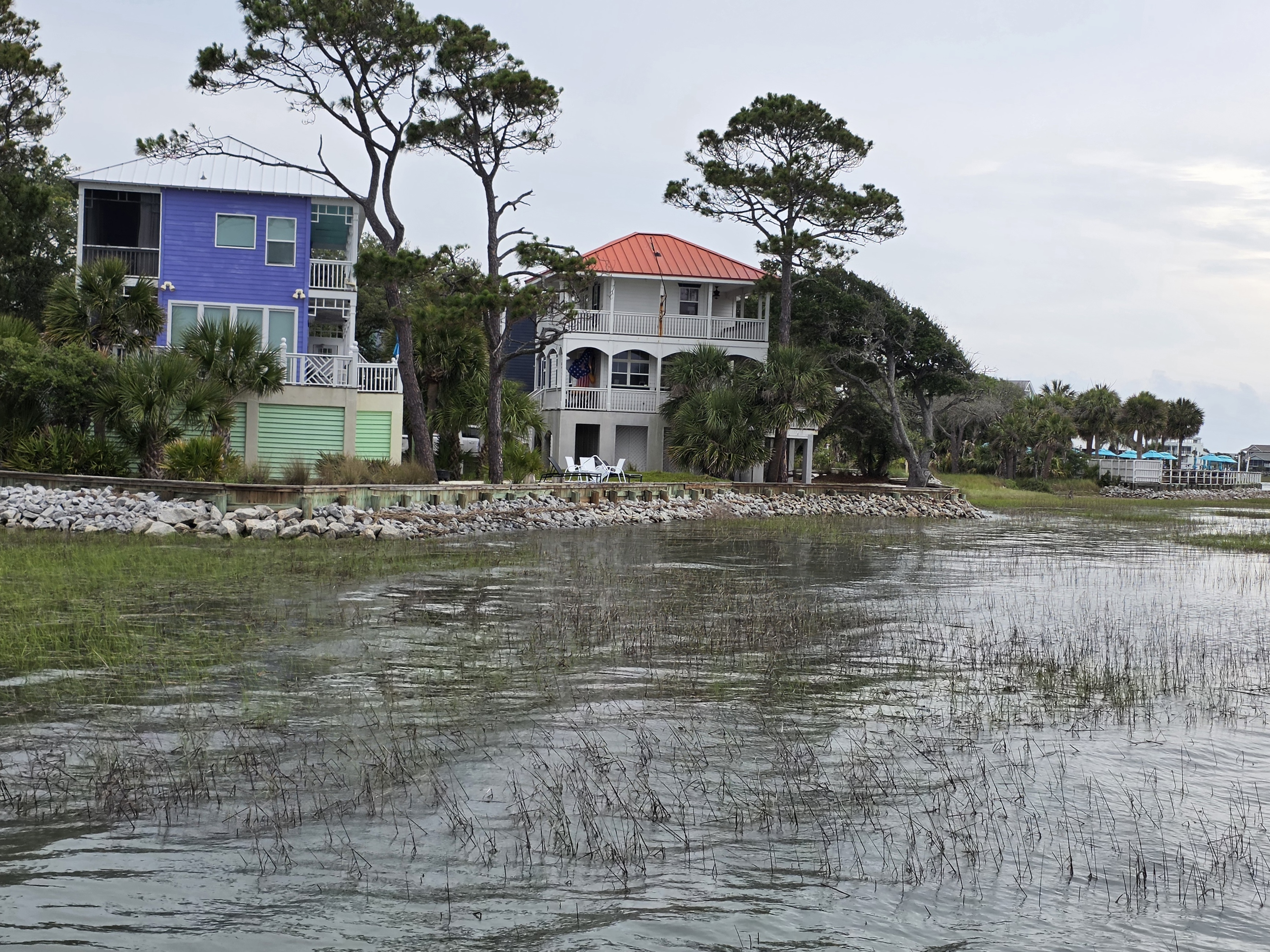 Two houses that back up to the ocean.